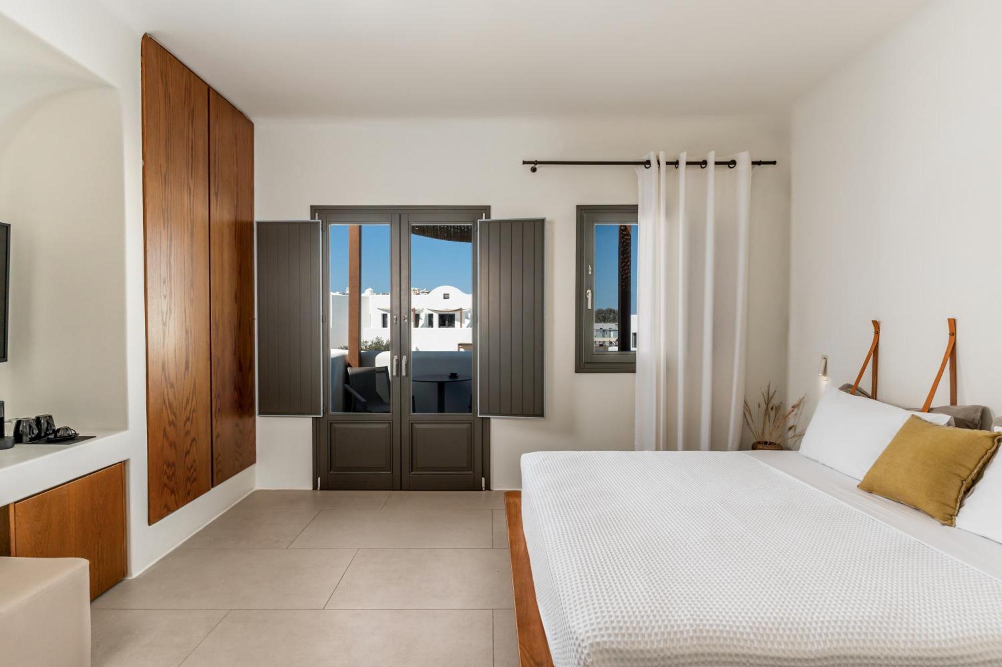 Orama Hotel & Spa 산토리니 외부 사진 A bedroom at the hotel